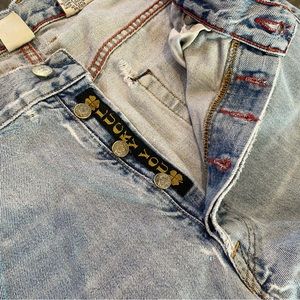 vintage lucky blue, distressed jeans.